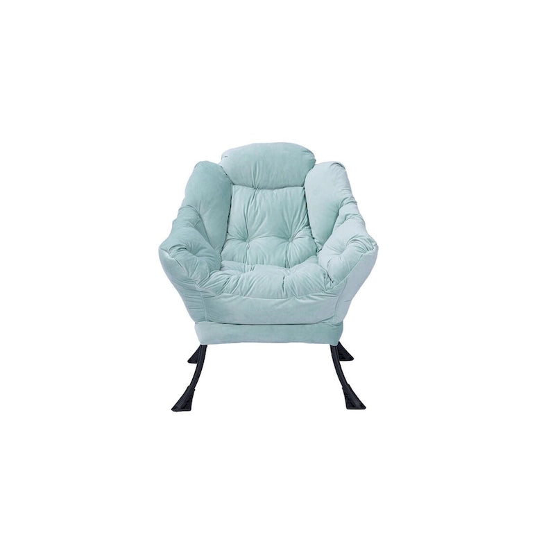 Fauteuil capitonné vert avec poche latérale